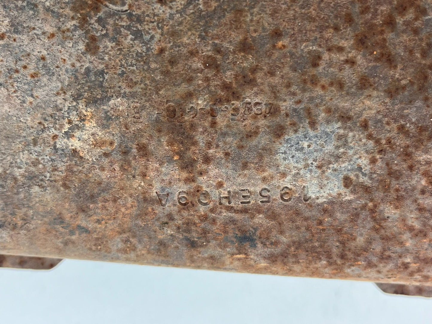 6957671