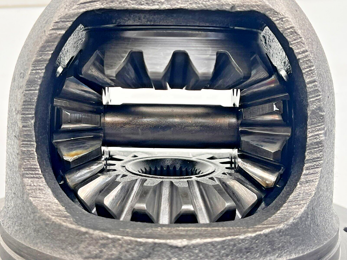 7699488