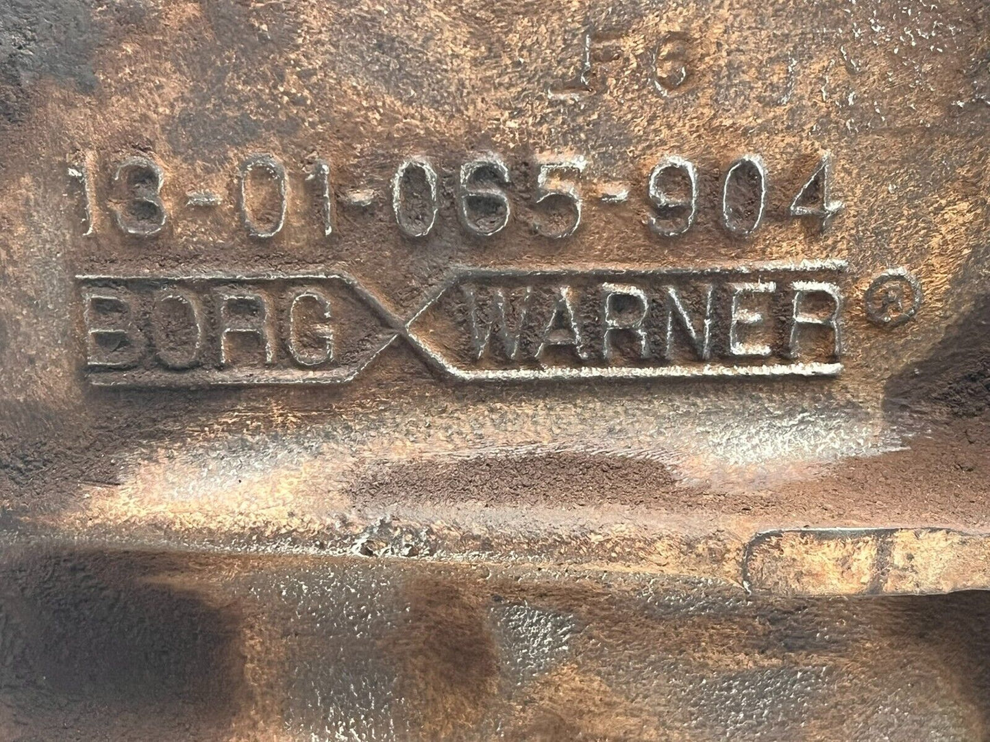 6980703