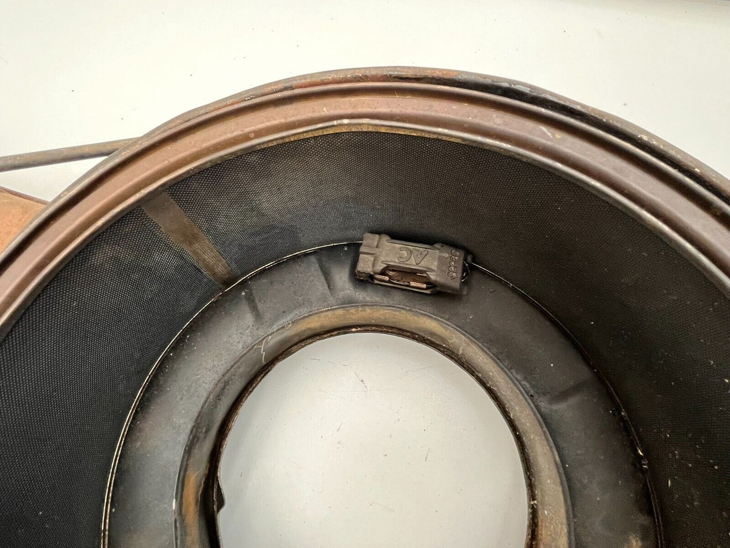 6980702