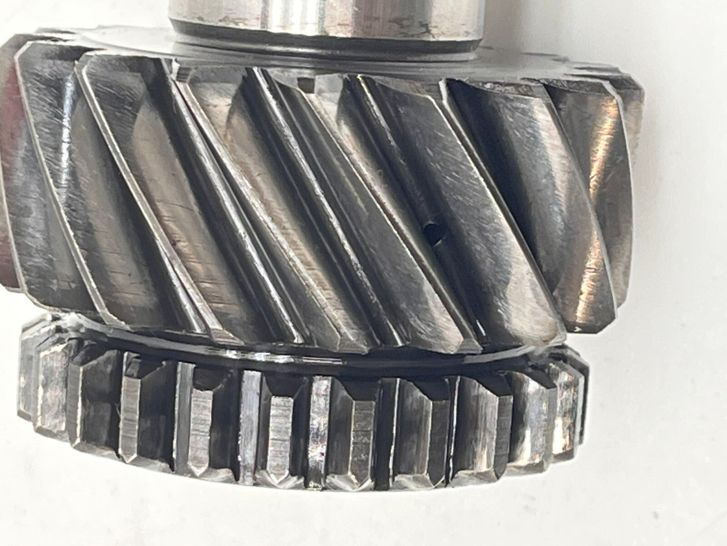 7750125
