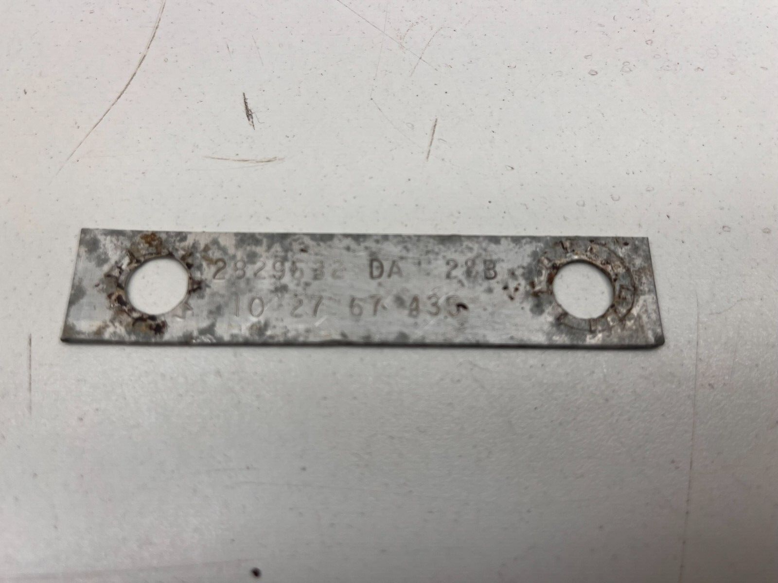 7673690