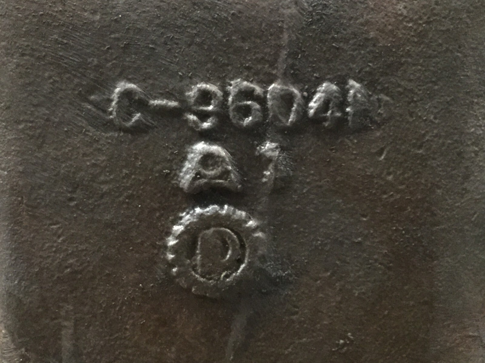 7673696